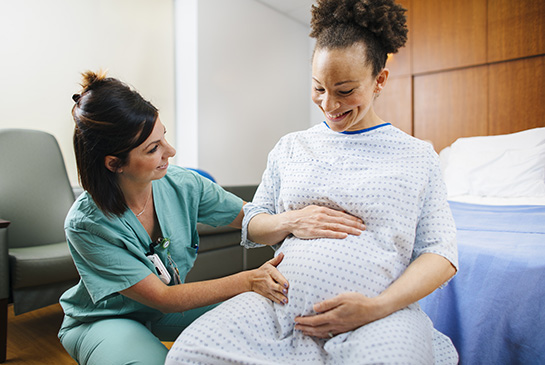 A nurse with a maternity patient