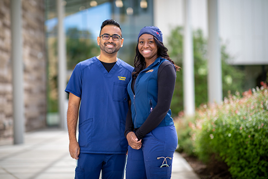 Two nurses at smile for the camera