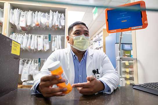 Pharmacist giving a consult