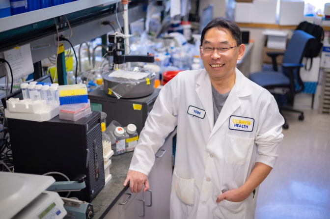 image of a scientist centered in his laboratory