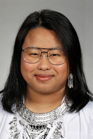 Portrait of medical student Zang Yang in white coat and smiling