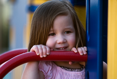 image of little girl on playground