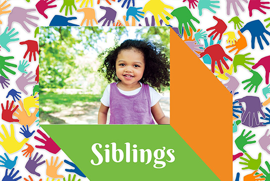 girl smiling and surrounded by painted hands with green and orange graphics surrounding the girl
