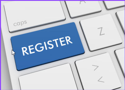 Close-up of a keyboard with a blue key labeled “Register”