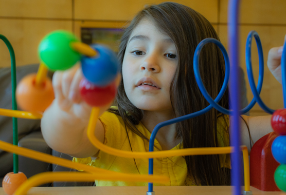 A child playing with a toy.
