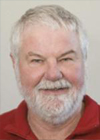 Bill Lasley, Ph.D. smiling in a professional headshot