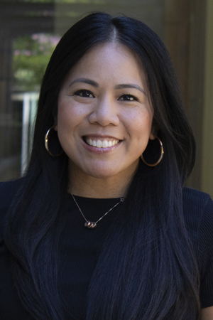 Catrina Calub, Ph.D., smiling in a professional headshot