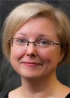 Cristina Davis, Ph.D. smiling in a professional headshot