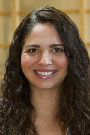 Crystal Herrera smiling in a professional headshot