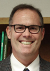 Daniel J. Tancredi, Ph.D. smiling in a professional headshot