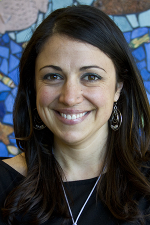 Nancy Castignetti, M.Ed., M.S. smiling in a professional headshot  