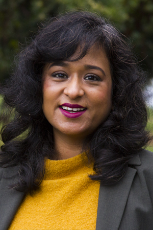 Prerona Mukherjee, Ph.D., smiling in a professional headshot