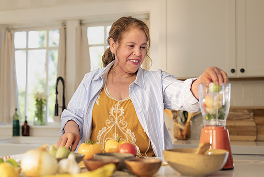 UC Davis Health patient Cecilia preparing salsa.