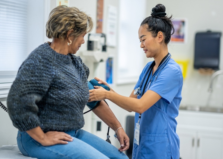 female provider examining a female patient