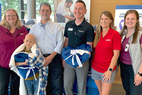Heart shaped pillow converts to blanket donated by Maita Subaru