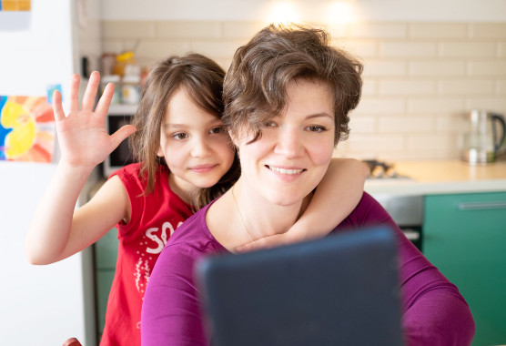 Child and mother at a virtual clinical session.