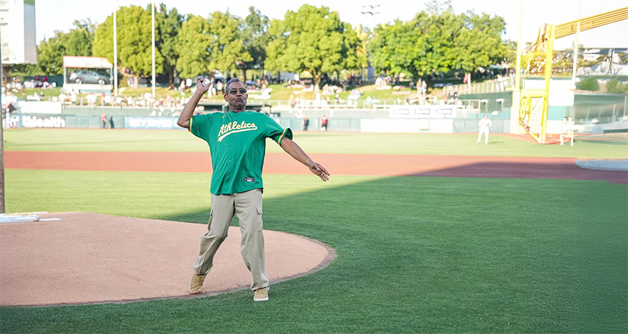 George Evans throws first pitch at A’s game against the Astros to help raise awareness about prostate cancer.