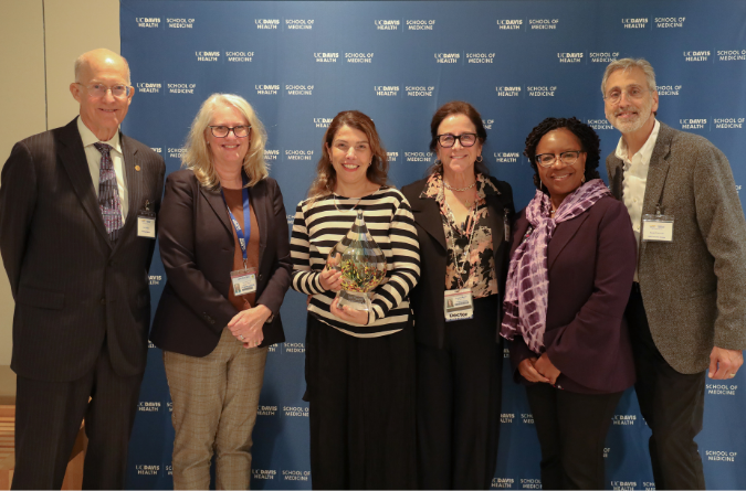 A group of people with 2025 award winner Gozde Goncu-Berk, PhD