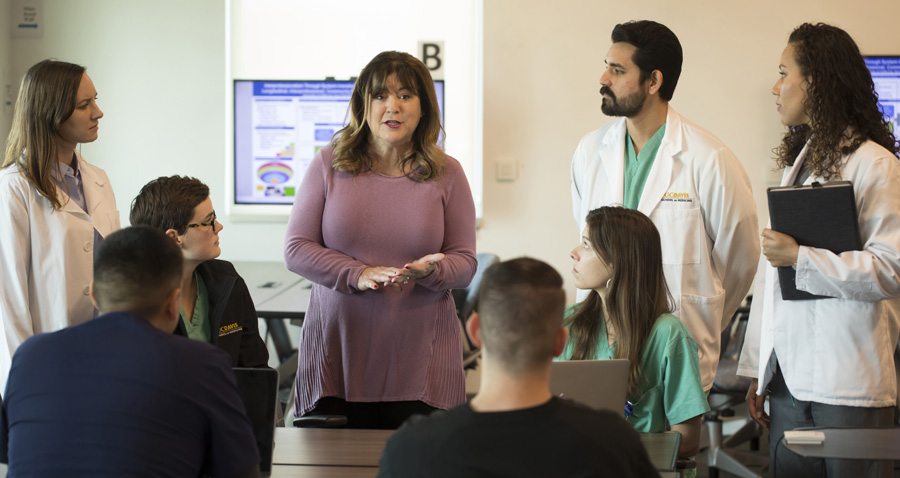 Debra Bakerjian, center, a clinical professor at the School of Nursing, leads an education research project 